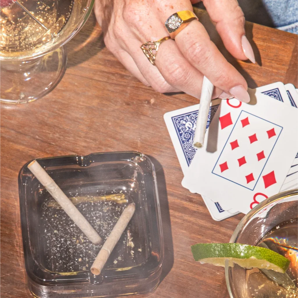 Hand holding a pre-roll